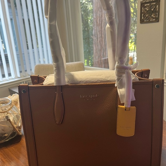 kate spade brown tote with yellow tag